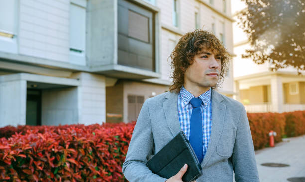 istock Businessman talking on the mobile 912898522