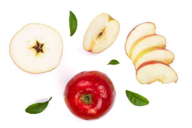 istock red apples with slices and leaves isolated on white background top view. Set or collection. Flat lay pattern 912899240