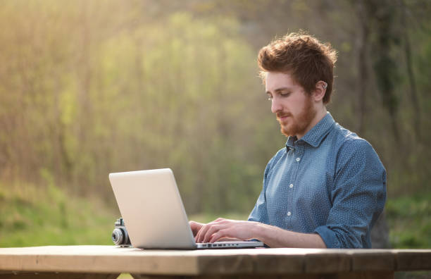 istock Young man working outdoors 912903816