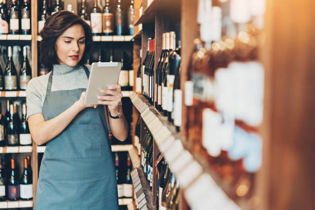 istock Wine shop manager with digital tablet 912903952