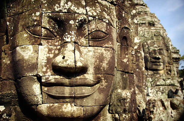rostos de de bayon, angkor thom - eternity spirituality landscape rock imagens e fotografias de stock