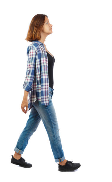 istock back view of walking  woman. 912907880
