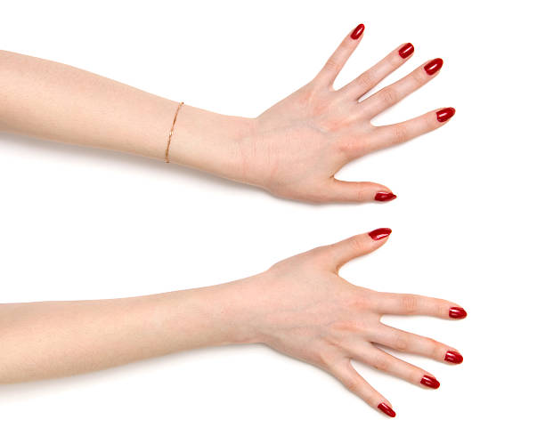 dwie kobiety ręce szeroko otwarte - red nail polish zdjęcia i obrazy z banku zdjęć