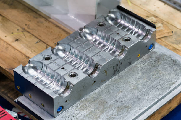 istock plastic mold of plastic bottle blowing porcess 912910674