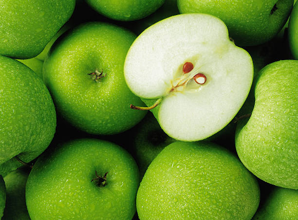 Group of apples  green apple slice stock pictures, royalty-free photos & images