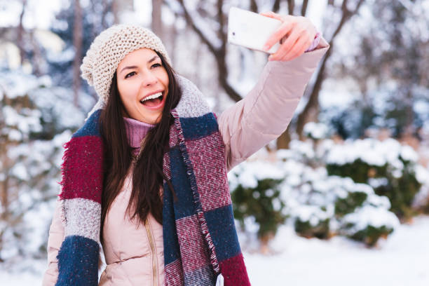 istock Beautiful girl taking self portrait 912919470