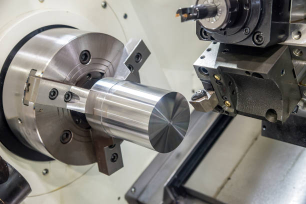istock The CNC lathe  machine clamping  steel rod . 912924490