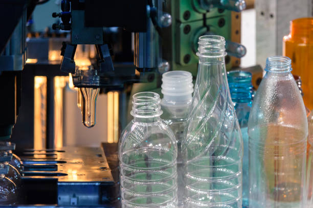 istock Abstract scene of  blowing bottle process  and  plastic bottle product. 912924596