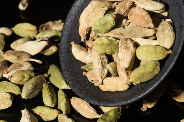 istock Macro collection, dried green cardamom pods close up 912924792