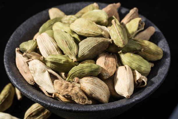 istock Macro collection, dried green cardamom pods close up 912924812