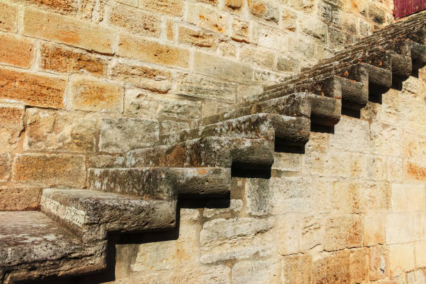 istock Old stone fortress wall with stone stair, background 912924996