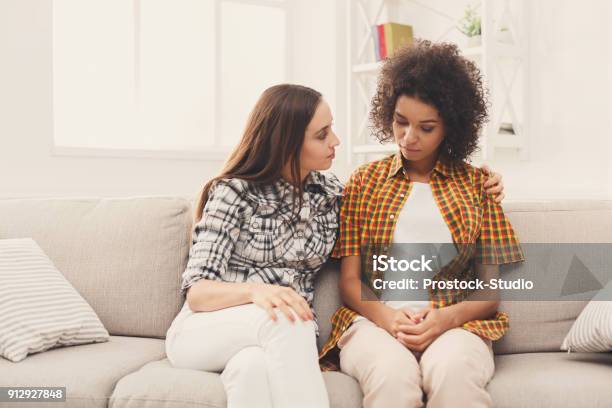 Two Women Talking About Problems At Home Stock Photo - Download Image Now - Friendship, Discussion, Talking