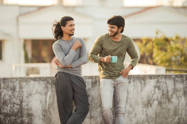 Cheerful young friends chatting