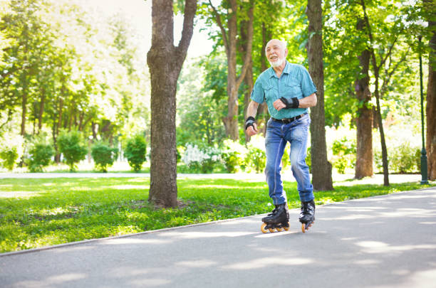 istock Senior man roller skating outdoors 912936496