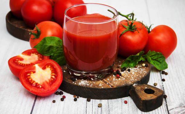istock Glass with tomato juice 912940102