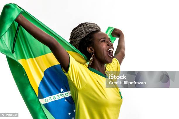 Brazilian Female Athlete Fan Celebrating On White Background Stock Photo - Download Image Now