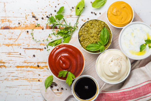 istock Selection of different sauces in bowls 912943840