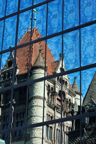 istock Reflection of Trinity Church at Copley Square in downtown Boston 912944806
