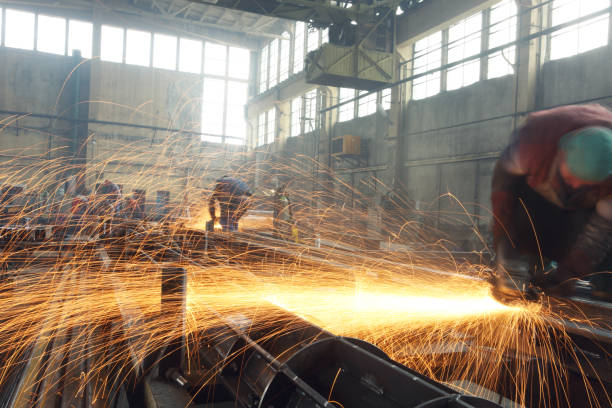 istock grinding huge steel beams 912945274
