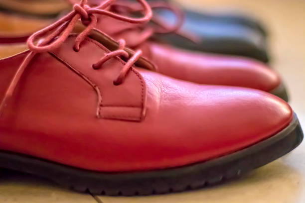 istock Red women's shoes without a heel in line 912945952