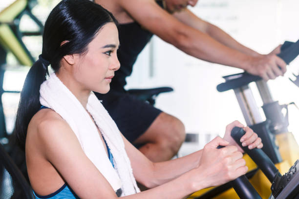 istock Fitness woman execute exercise with exercise-machine at the gym 912951766