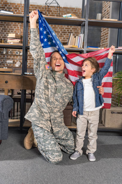 istock military father and son with usa flag 912962164