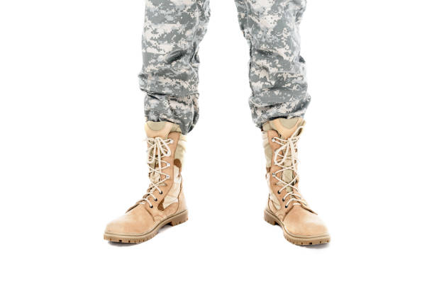 istock soldier in military uniform 912971558