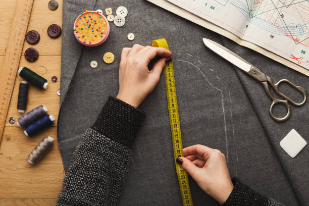 istock Top view on fashion designer working at messy table 912986002