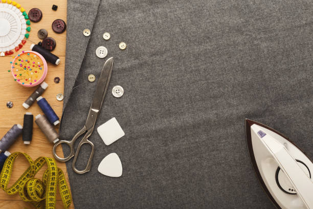 istock Top view on fashion designer working at messy table 912986086