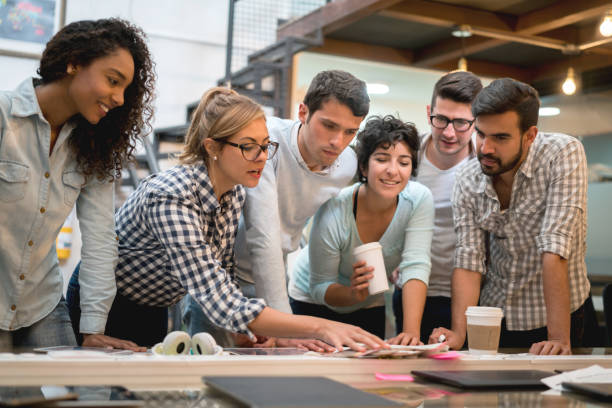 istock Group of people in a business meeting at a creative office 912996732
