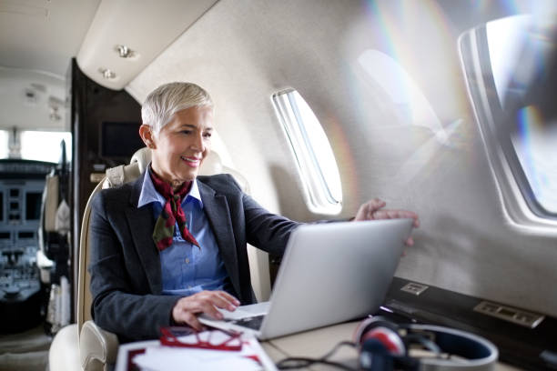 istock Businesswoman in private jet airplane 913001064