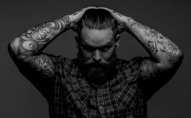 istock tattooed male with beard 913001418