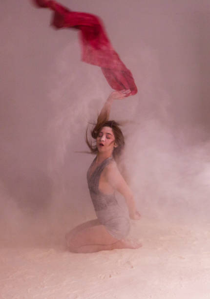 istock Young woman dancer dancing and posing with shawl in studio at istanbul turkey 913006616