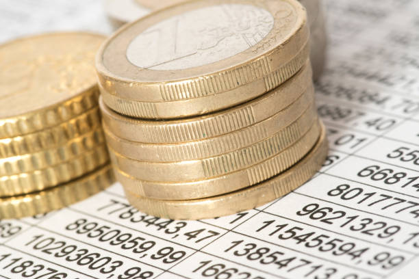 istock Euro coins and a spreadsheet 913007052