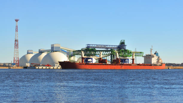 istock port cargo cranes and ship fragment at the docks 913007356
