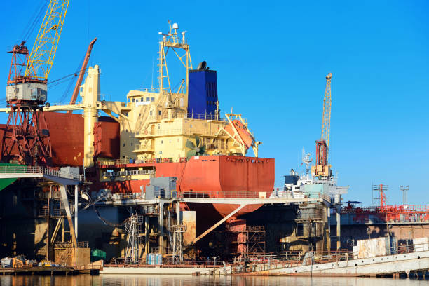 istock port cargo cranes and ship fragment at the docks 913008020