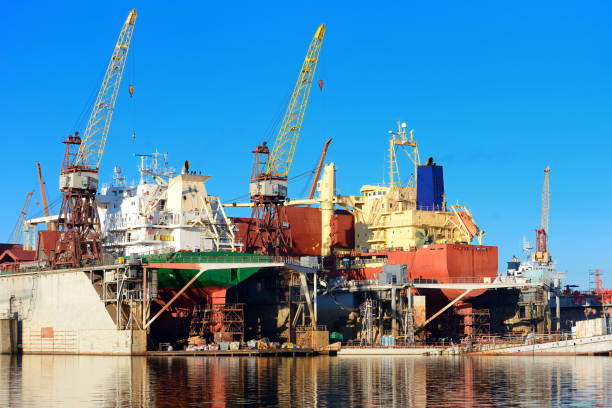 istock port cargo cranes and ship fragment at the docks 913008024