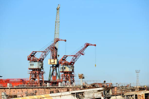 istock port cargo cranes and ship fragment at the docks 913008678