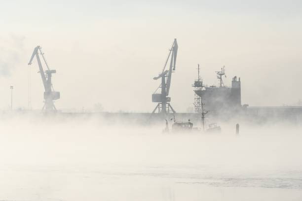 istock port cargo cranes and ship fragment at the docks 913009016