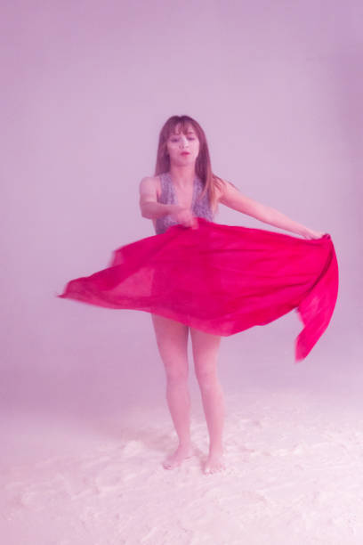 istock Young woman dancer dancing and posing with shawl in studio at istanbul turkey 913010406