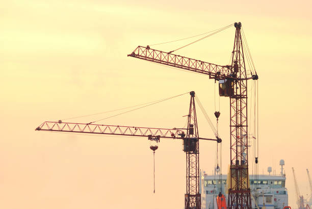 istock port cargo cranes and ship fragment at the docks 913010734