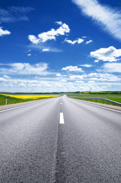 istock classic scene of a highway in rural area 913010800