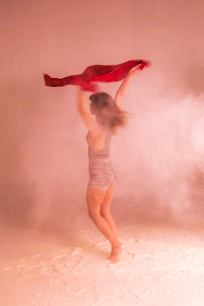 istock Young woman dancer dancing and posing with shawl in studio at istanbul turkey 913010994