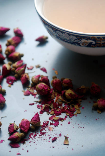 istock Cup of rose tea with rosebuds on the plate. 913017570