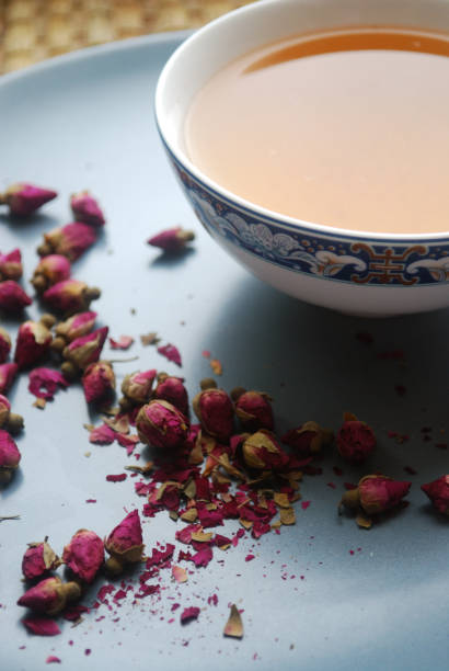 istock Cup of rose tea with rosebuds on the plate. 913017576