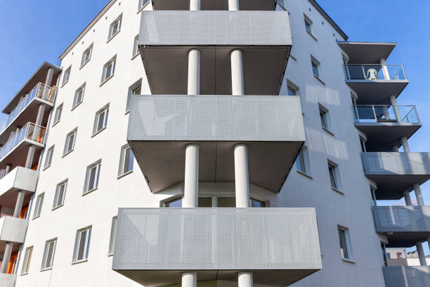 istock Rows of balconies in modern white apartment building 913017780