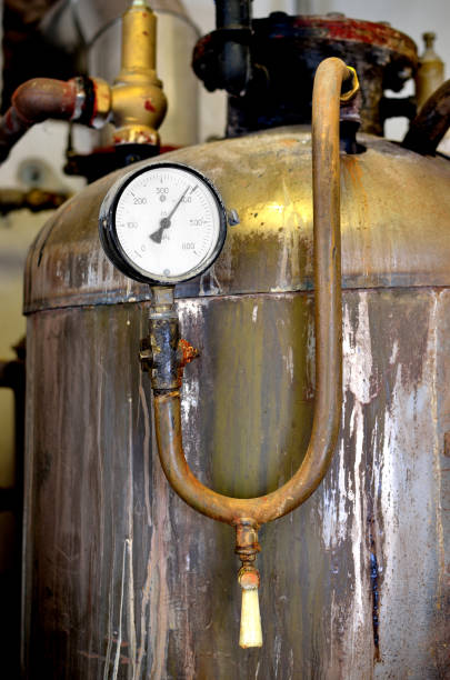 istock thermometer close-up in old rusty industrial boiler room 913023324