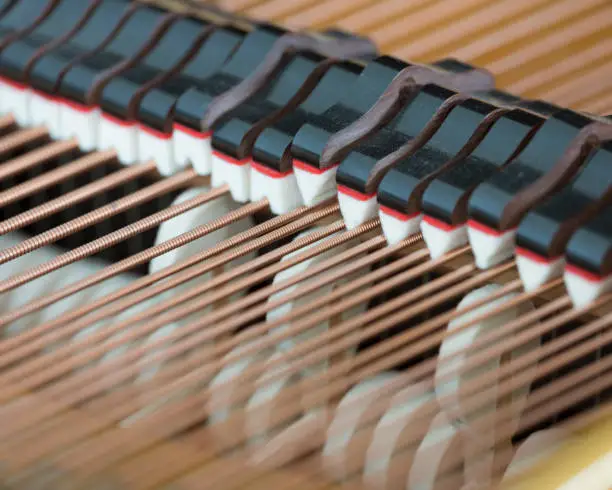 abstract look into the inside of a bechstein grand piano