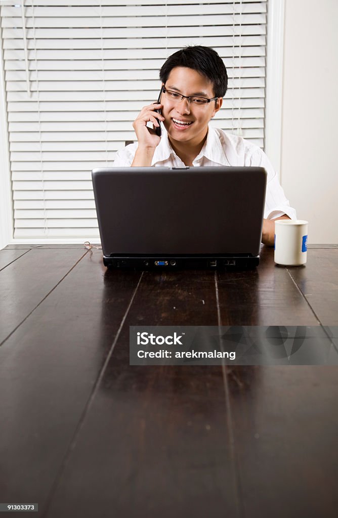 Asian entrepreneur on the phone  20-29 Years Stock Photo