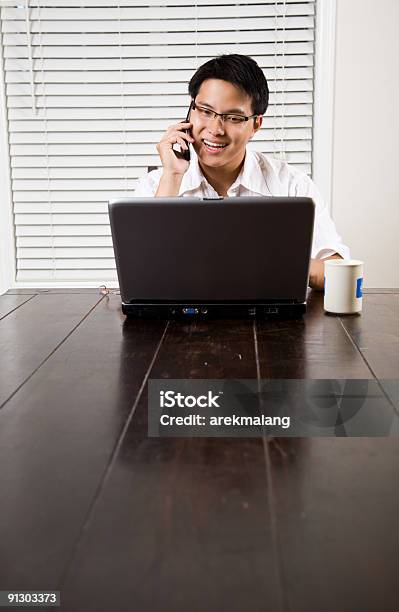 Asian Entrepreneur On The Phone Stock Photo - Download Image Now - 20-29 Years, Adult, Business